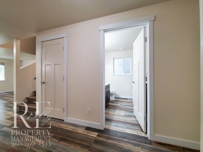 Photo - Modernized Two-Story with Open Layout, Gas Fireplace & Large Fenced Yard