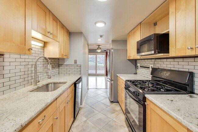 Photo - Nicely Remodeled 3 bed / 3.5 BATH's - 3 level brick TH in sought after Columbia on a premium lot