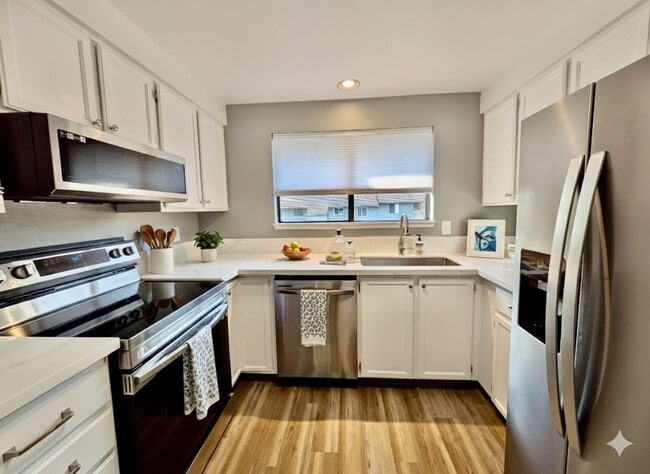 Photo - Stunning 2 Bedroom Condo with Fireplace, Modern Upgrades and Air Conditioning! Dogs Welcome