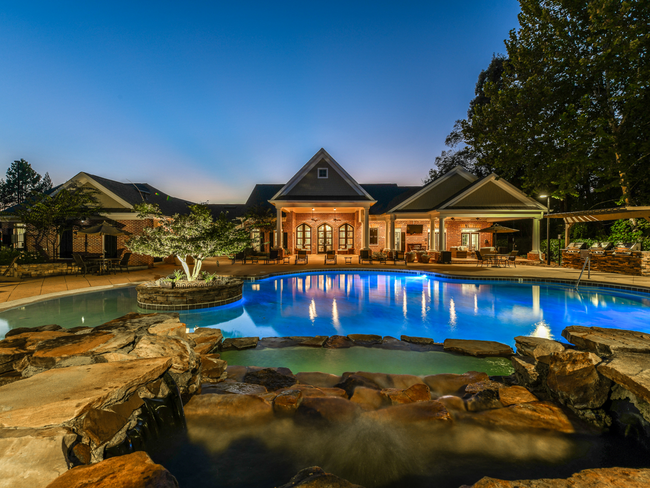 The Resort-Style Pool at Dusk - Walden at Providence Rental