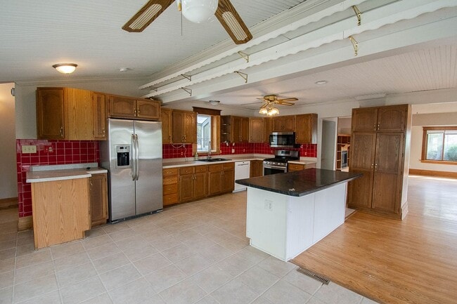 Photo - Bright, freshly painted home with HUGE garage space!