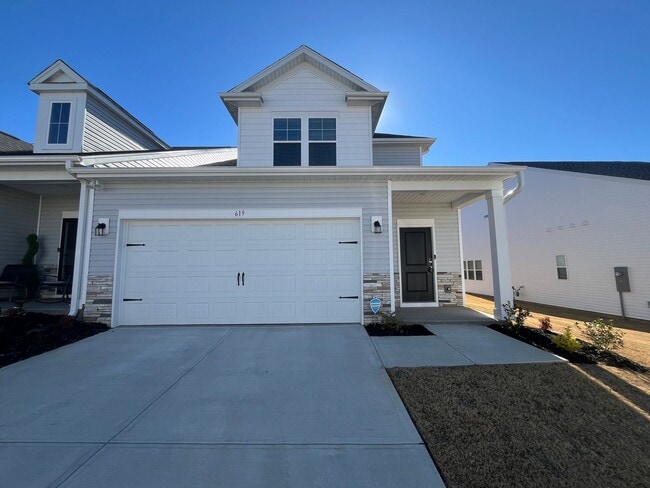 Building Photo - New 4/3 Townhome Available Now