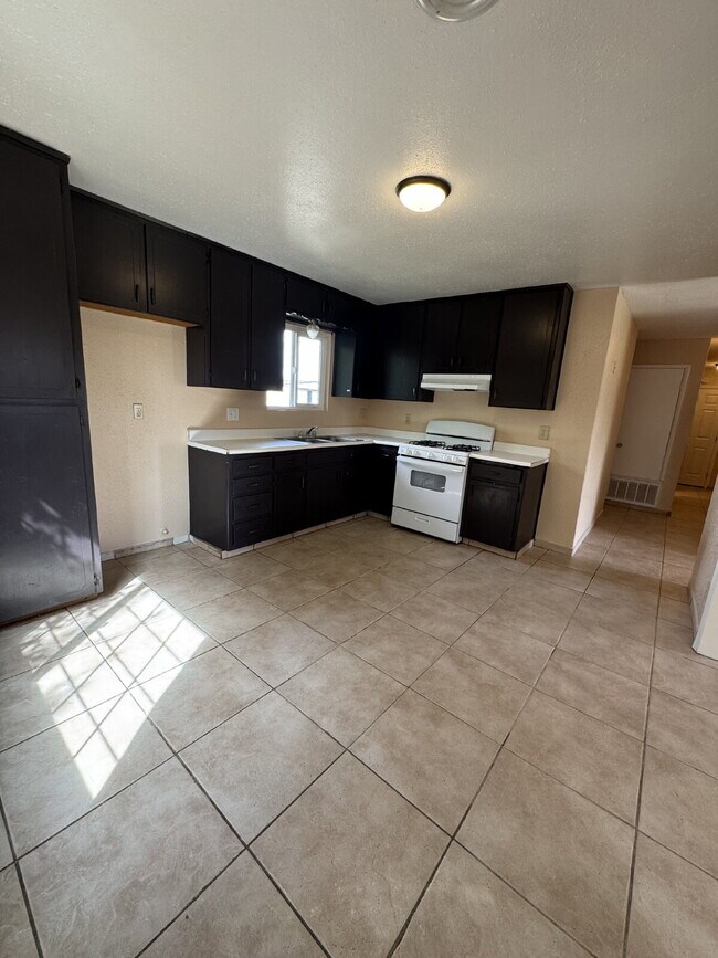 Photo - Water, sewer, garbage and landscaping is i...