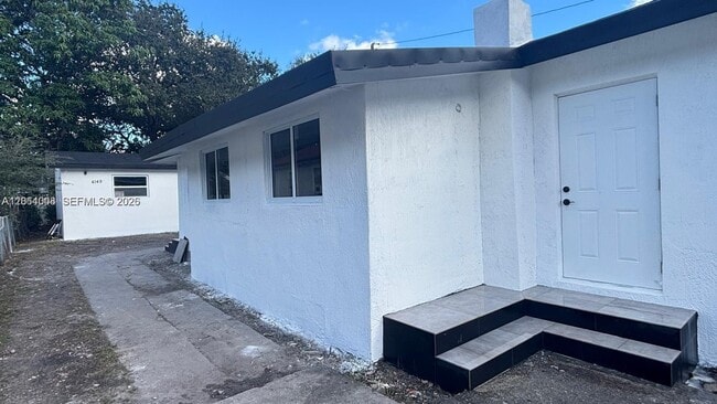 Building Photo - 4147 NW 23rd Ct Unit 4147