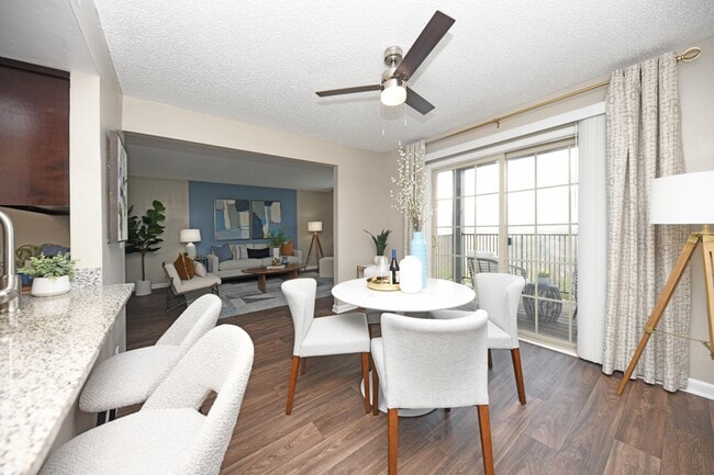 Dining area with hardwood-style flooring