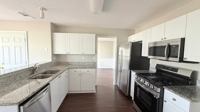 Photo - 4BR Home with High Ceilings & Main-Level Suite In Hillgrove District