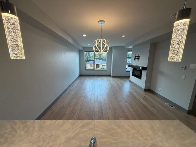 Photo - Modern 2-Bed Townhouse with Scenic Views in Denver's Heart-built in EV charger!