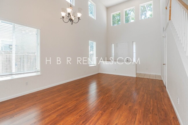 Photo - Spacious 5-Bedroom Retreat with Cozy Fireplace in Prime Tracy Location!