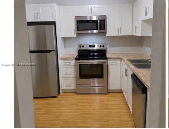 Building Photo - 5401 SW 77th Ct Unit 202E