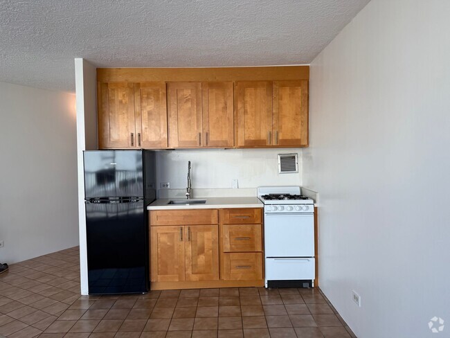Building Photo - Upgraded studio at the Holiday Village $16... Unit 512 Rental