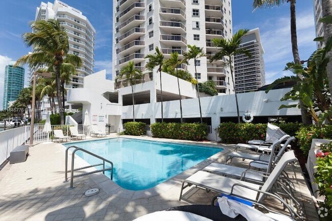 Building Photo - 5880 Collins Ave Unit 306 Rental