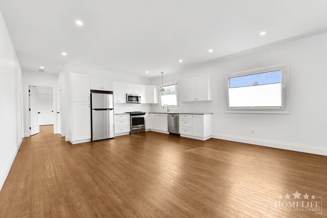 Spacious Executive 3-Bedroom Suite with Private Yard & Utilities Included