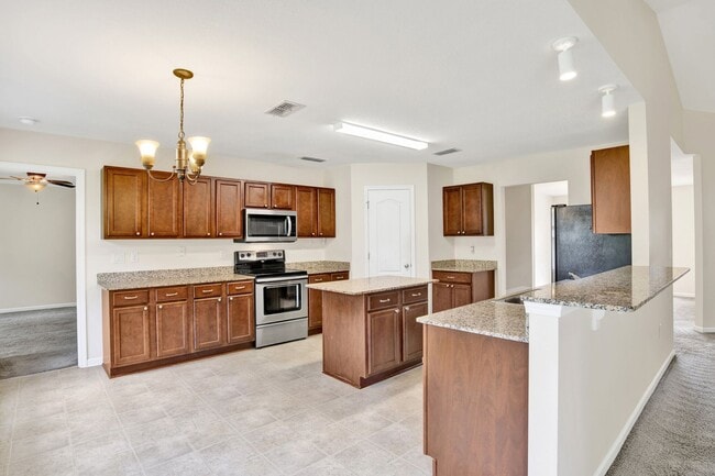 Photo - Charming 4-Bedroom Home with Spacious Yard