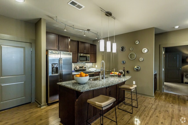 Kitchen islands featuring granite counters