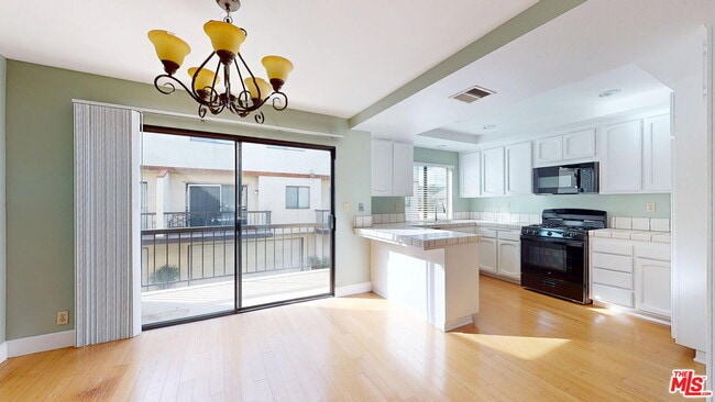 Building Photo - 22525 Sherman Way Unit 1403