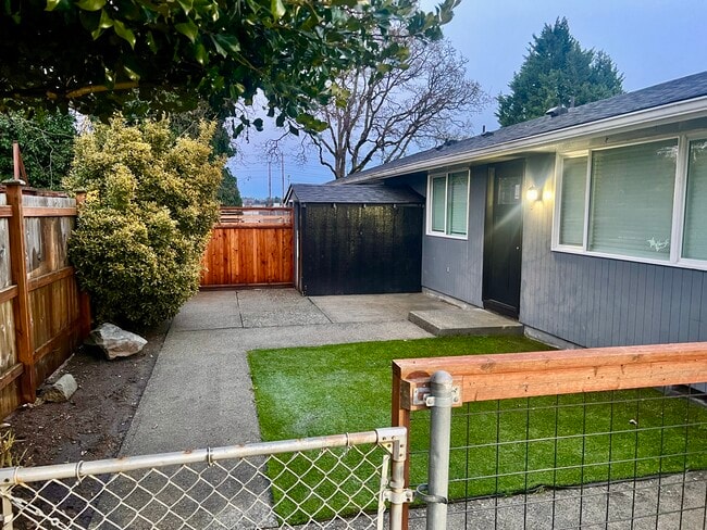 Front: turf, shed - 6722 S Monroe St Unit B