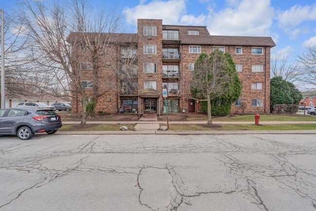 Building Photo - 7117 W 93rd St Unit 102