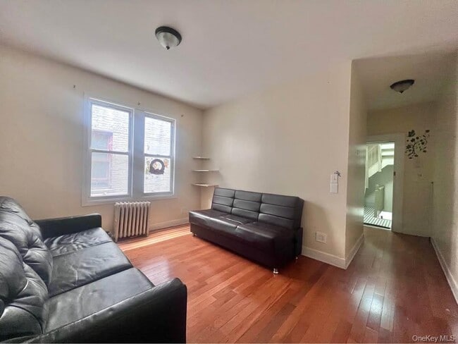 Building Photo - 81-36 Baxter Ave Unit 2F Rental