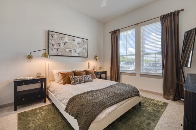 Bright, spacious bedroom with abundant natural light at Residence at Pearsall Park