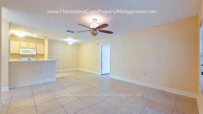 Photo - MOVE IN READY! LARGE 2 BEDROOM/2 BATH PLUS ATTACHED GARAGE! TILE/LVP THROUGHOUT!