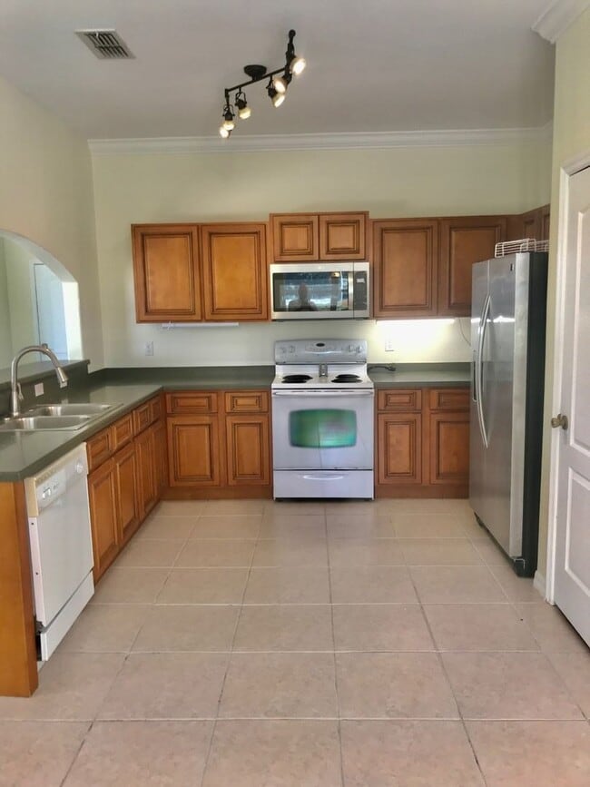 Photo - Great 4 bedroom pool home in gated community