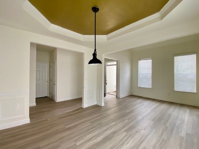 Photo - 1/2 MONTH FREE! ?Upgraded 4BR with Brand New Flooring & Private Backyard – Available Feb 15