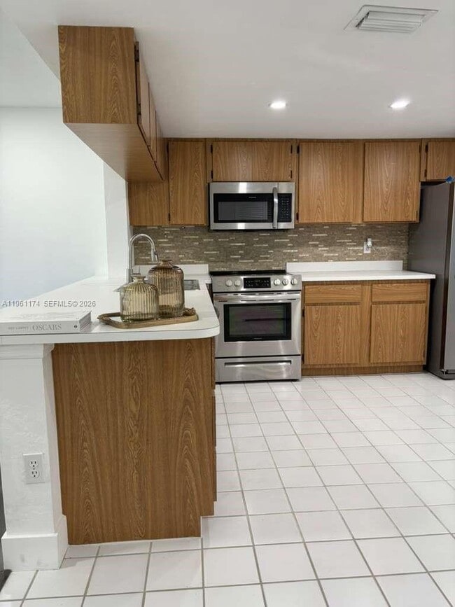 Building Photo - 1005 Palm Beach Trace Dr Unit 1005