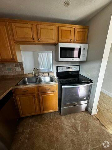 Building Photo - 2800 NW 56th Ave Unit D304 Rental