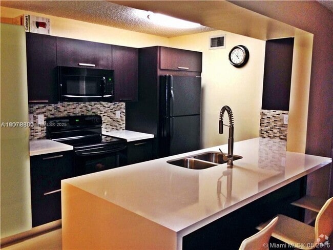 Building Photo - 4652 NW 97th Pl Unit 235 Rental