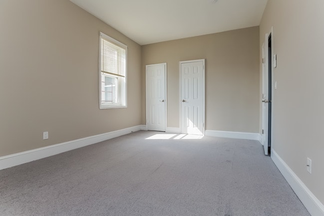 Newly Renovated Apt - Carpeted Bedroom