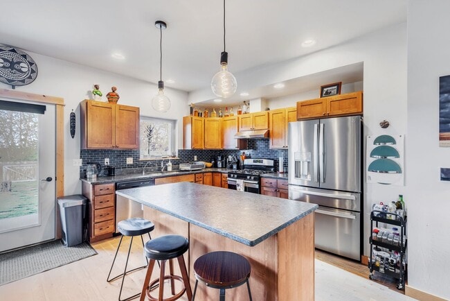 Photo - Furnished townhome w/ 2-car garage, backya...