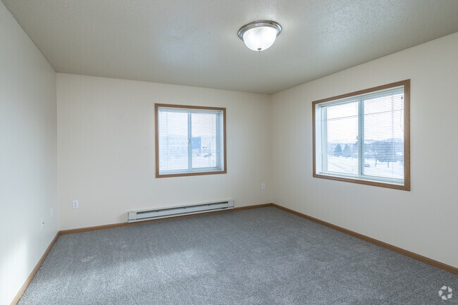 2BR, 2BA + Den - 1,068SF - Primary Bedroom - Country Meadows Apartments