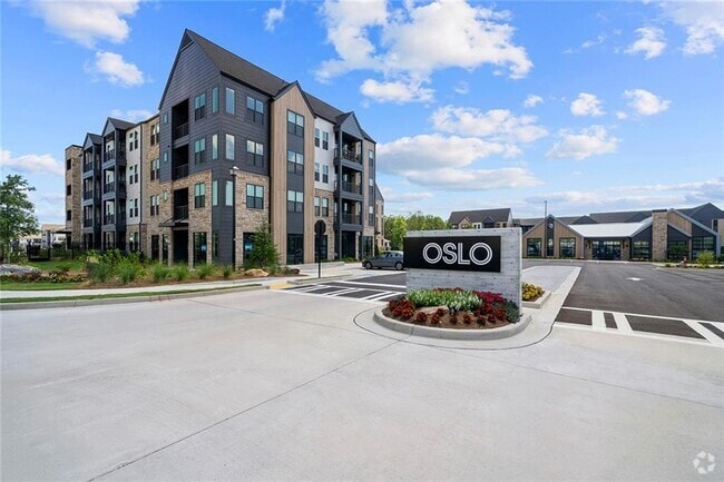 Building Photo - 7000 Renaissance Pkwy Unit C1 Rental