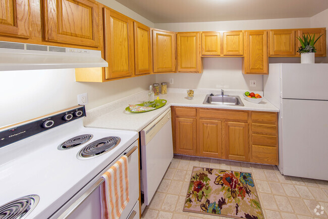 Kitchen (cabinets & appliances vary) - Medical Center Court Rental