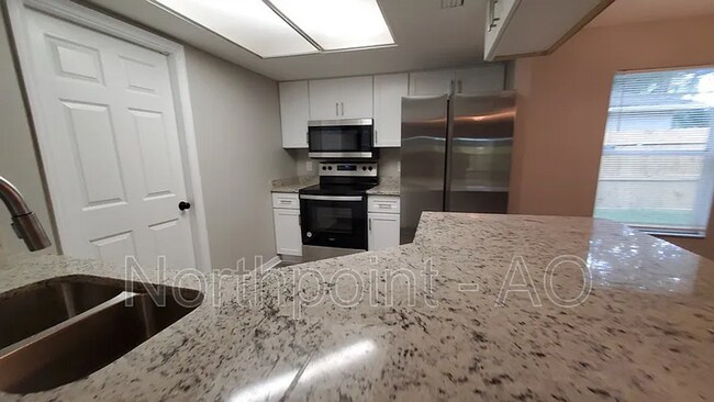 Photo - Move-In Ready 3 Bed Home with Garage & Fenced Yard in Tampa, FL