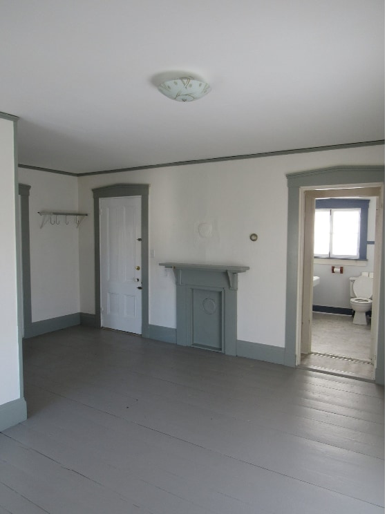 View from living room toward entrance and bathroom. - 34 Obrien Ave Unit 1