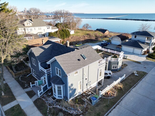 Rental is on the 2nd floor of this corner home, up the street from the Lake! Amazing views! - 2650 S Shore Dr Unit Upper