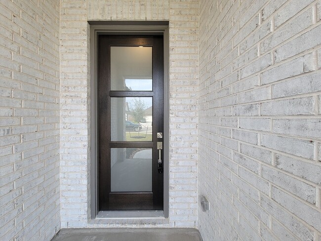 Photo - Come visit Brightland Homes, the most popular premium builder in Katy Lakes! This vibrant master-...