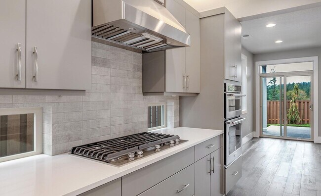 Photo - Bethany Stunner - 5 Bedrooms with Main-Level Bed & Bath, Modern Kitchen & Private Fenced Yard