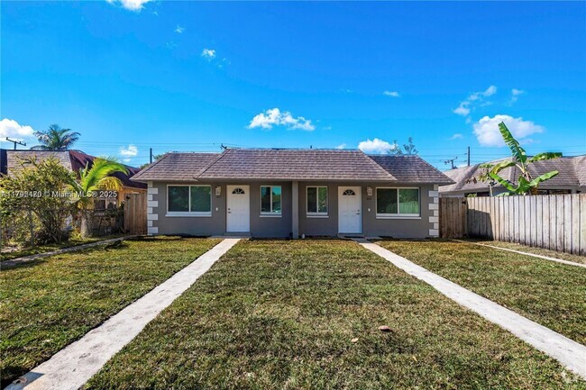 Building Photo - 1513 NW 8th Ave Unit 1513 Rental