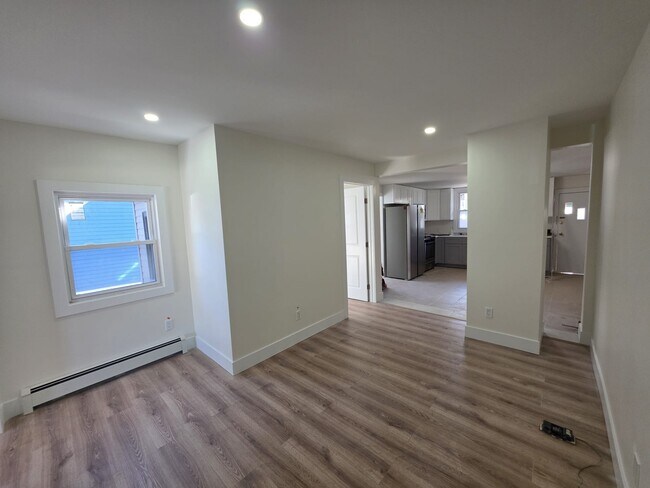 Livingroom. Entry door view. - 109 Ralph St Unit 1L