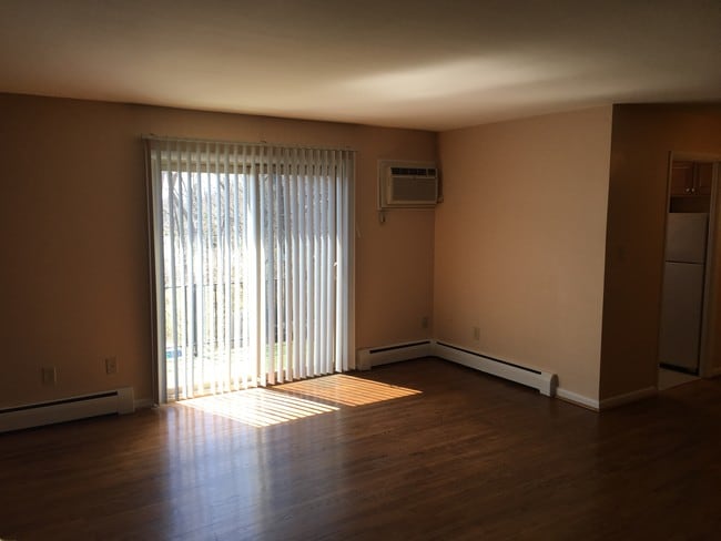 Living Room / Balcony - 8 Kenny Ct Apartments Unit 10