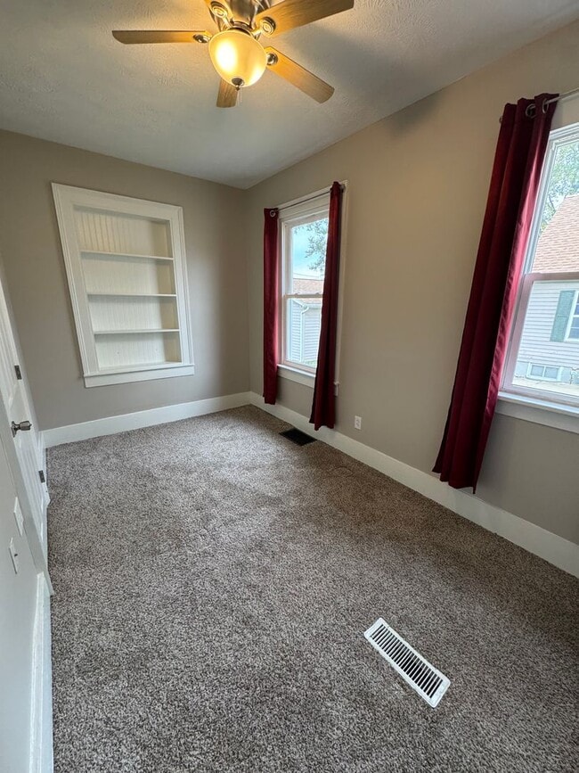 Photo - Charming 3-Bedroom Home with Den on Spacio...