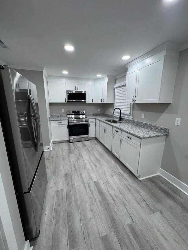 Photo - NEWLEY RENOVATED-This one won't last long! Schedule your tour today!