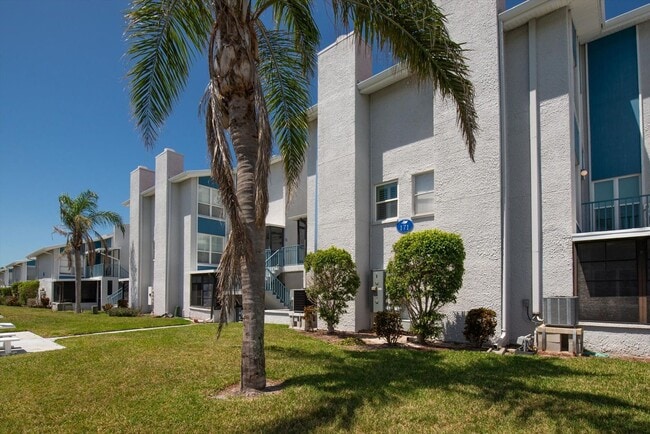 Building Photo - Gated Waterfront Community 1-Bedroom 1.5 ... Unit #F Rental