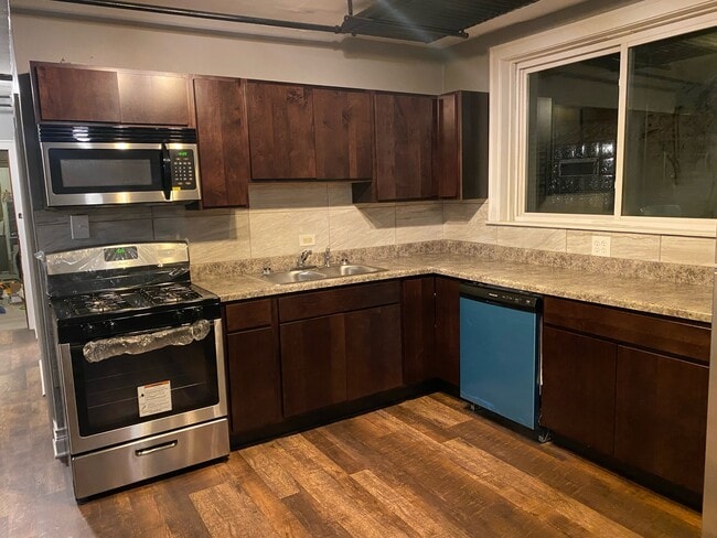 Building Photo - 8425 S Marquette Ave Unit 1