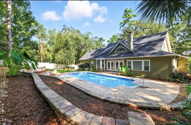 Photo - The Perfect Tallahassee 4 BR Family Home with Pool, Porch & Privacy