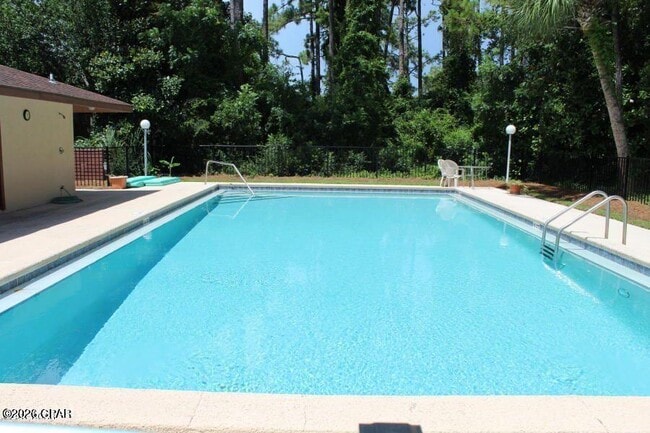 Building Photo - 8501 N Lagoon Dr Unit 209