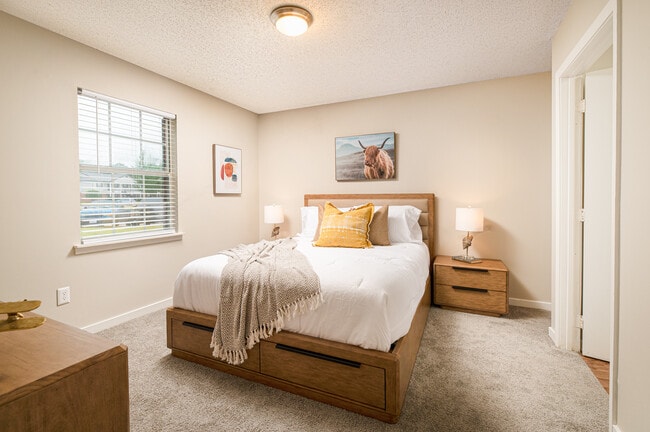 Wake up to natural light in this airy bedroom at Southwind Apartments in Richland, MS!