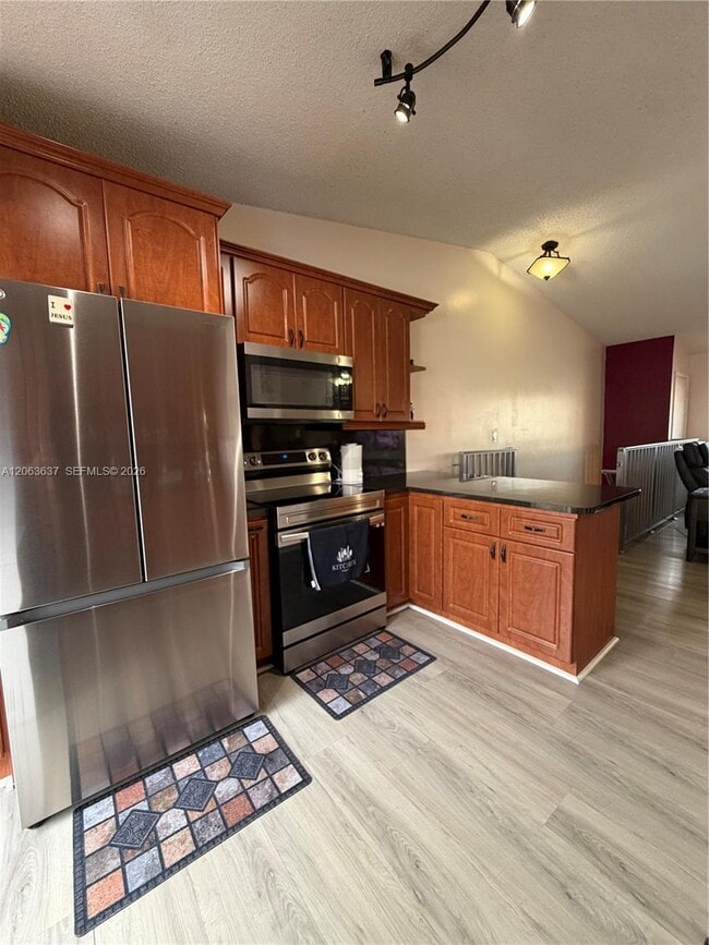 Building Photo - 7878 W 29th Ln Unit 202